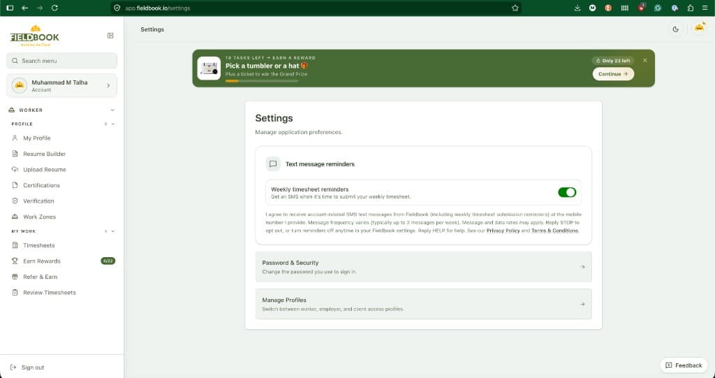 Fieldbook Settings page showing Text message reminders toggle for weekly timesheet reminders with SMS disclosure and Privacy Policy and Terms links